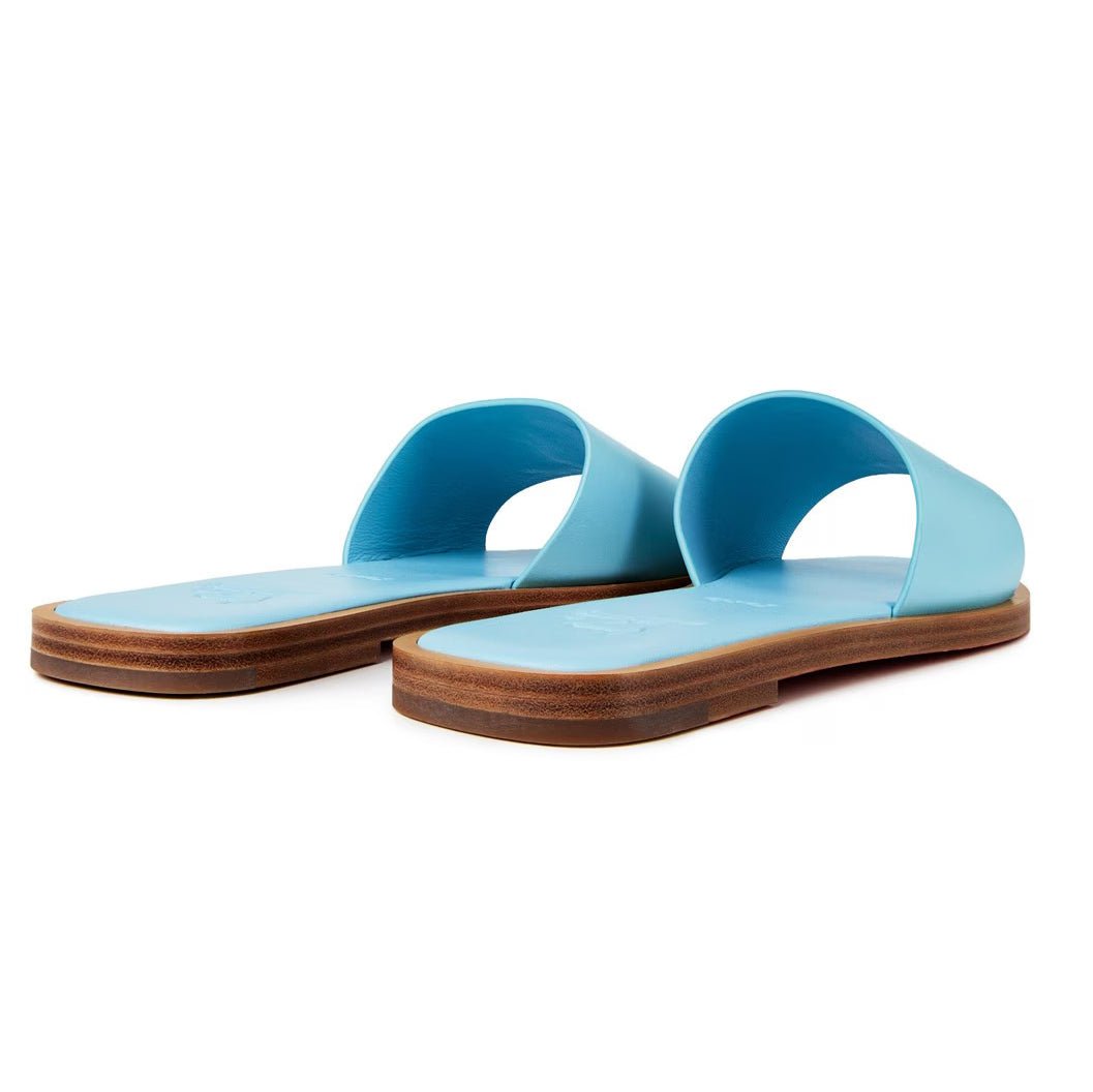 Christian Louboutin CL Embossed Leather Mules in Mineral Blue